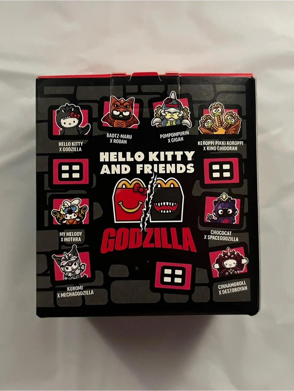 Hello Kitty Godzilla McDonald’s Happy Meal figure and box